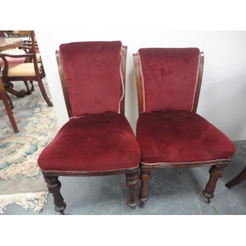 450 - Set of four Victorian mahogany dining chairs of graduated sizes, upholstered in later red velour, on... 