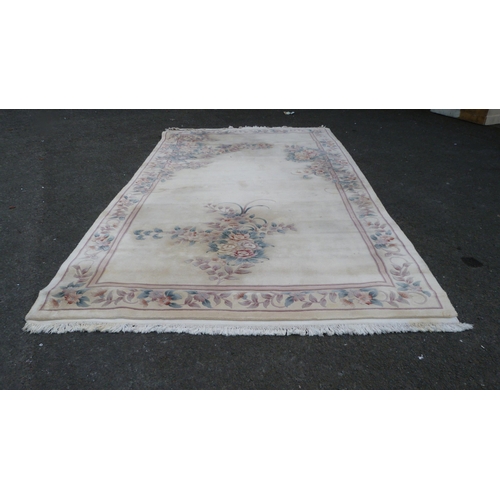 453 - Large Chinese-style cream rug.