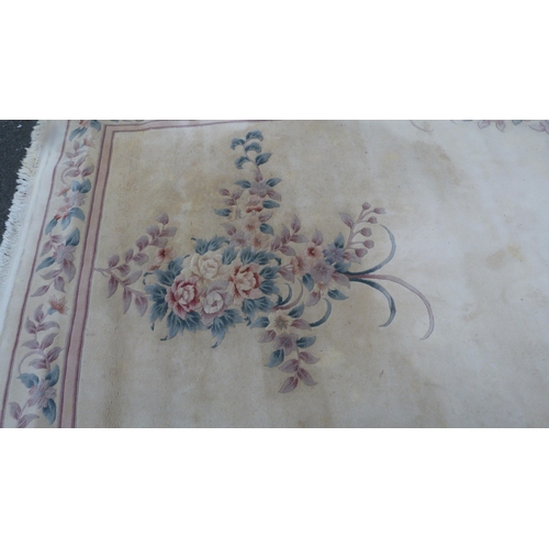 453 - Large Chinese-style cream rug.