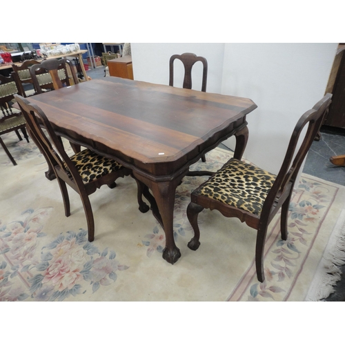 456 - Chippendale-style dining suite comprising dining table, four chairs and a sideboard.  (6)