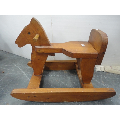 457 - Wooden rocking horse.