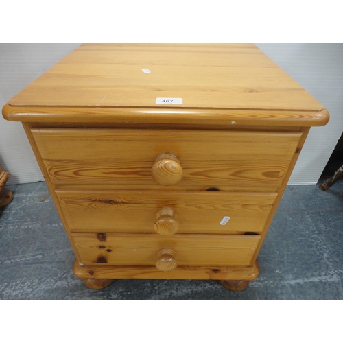 467 - Pine three-drawer bedside chest.