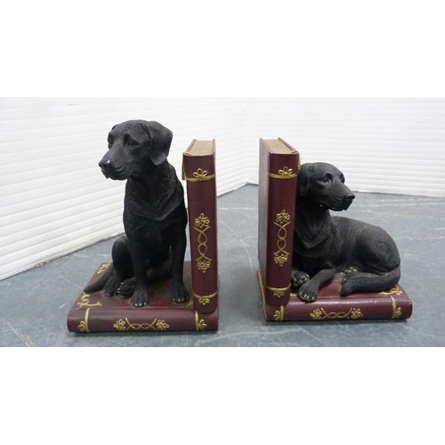 47 - Carton containing a bag with two lawn bowls, pair of contemporary dog bookends, brass-coated weights... 