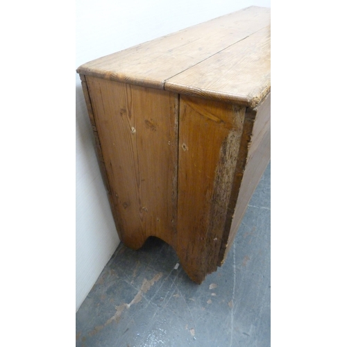 482 - Victorian pine coffer with a hinged top enclosing a candle box, on shaped feet, 67cm high, 132cm wid... 