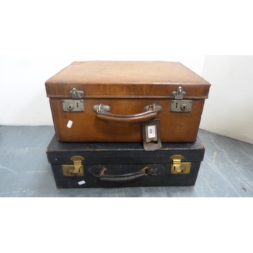 486 - Brown leather travel case and another, initialled 'MDW'.  (2)