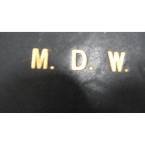 486 - Brown leather travel case and another, initialled 'MDW'.  (2)