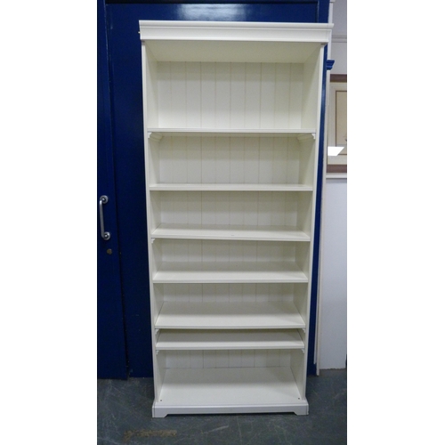 492 - Tall white open bookcase.