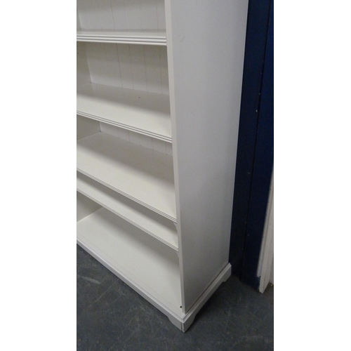 492 - Tall white open bookcase.