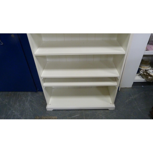 492 - Tall white open bookcase.