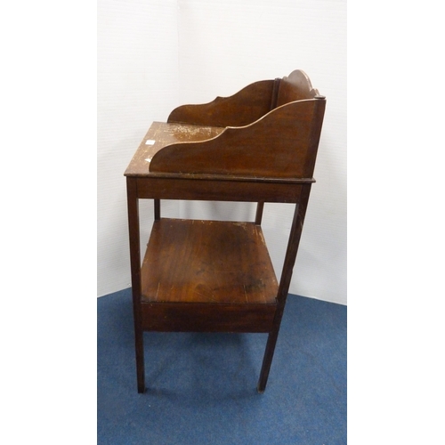 507 - Mahogany wash stand with three quarter gallery.