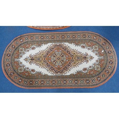 517 - Turkish Saray oval rug, and a similar circular rug,  (2)