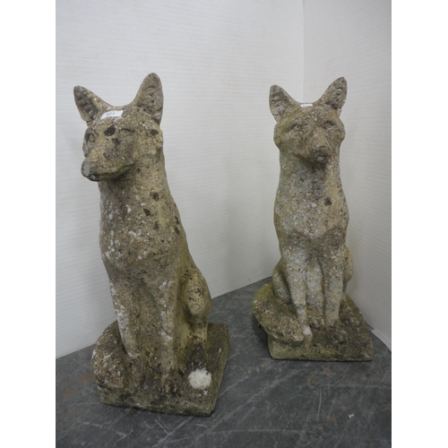 521 - Two composition garden figures modelled as foxes.  (2)