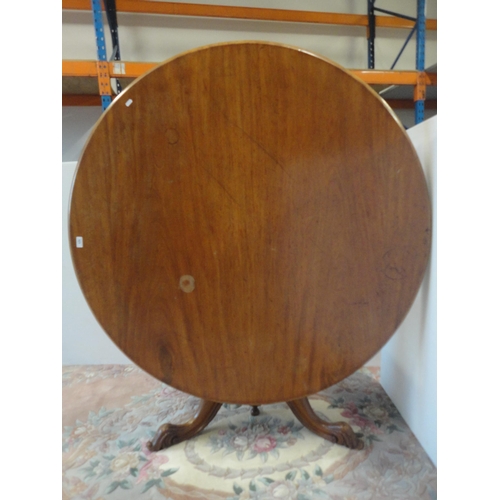 523 - 19th century mahogany breakfast table on tripod base.