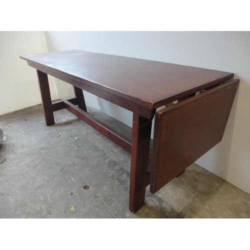 526 - Refectory-style table with drop-leaf to one end.