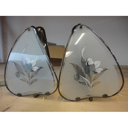 529 - Pair of metal wall lights with glass shades.