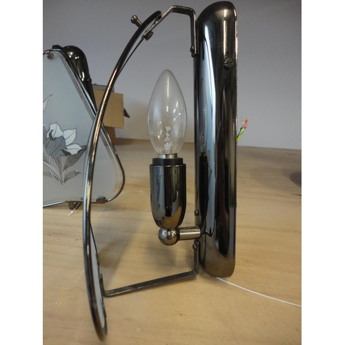 529 - Pair of metal wall lights with glass shades.