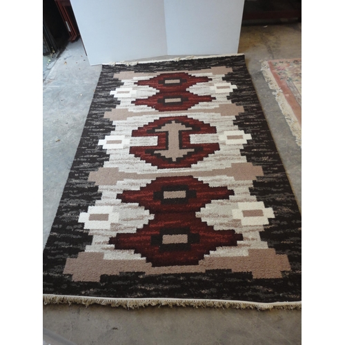 532 - Axminster 'Riga' design multi-coloured rug.