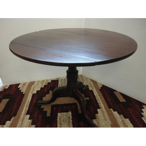 537 - George III mahogany tripod table.