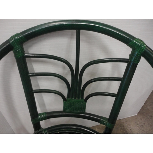 538 - Green-painted bamboo/cane chair.