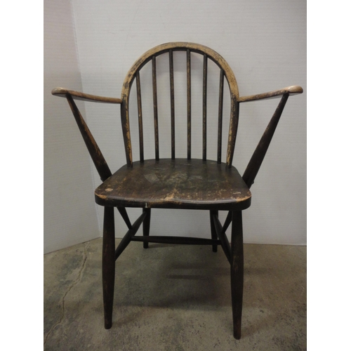 543 - Two Ercol-style elbow chairs.