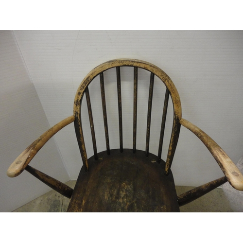 543 - Two Ercol-style elbow chairs.