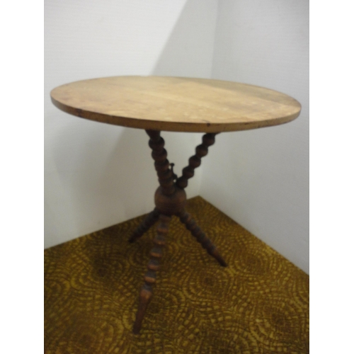 552 - Antique occasional table on bobbin-turned supports.