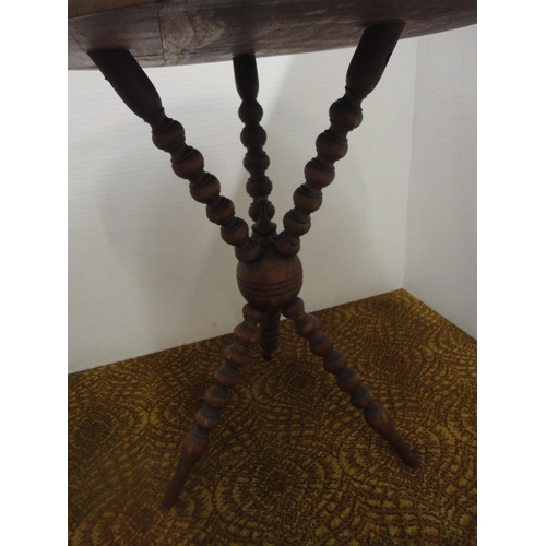 552 - Antique occasional table on bobbin-turned supports.