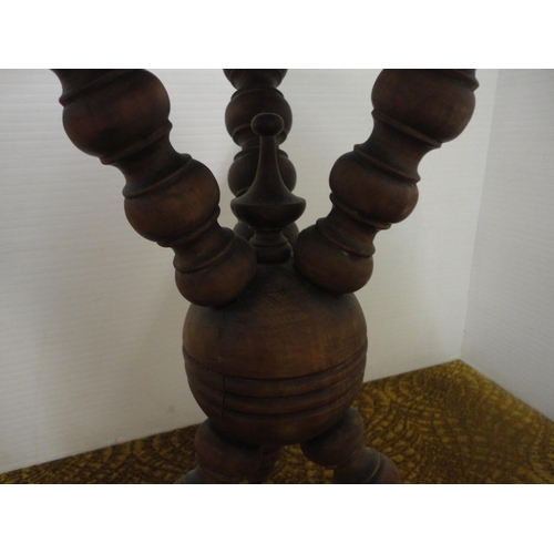 552 - Antique occasional table on bobbin-turned supports.