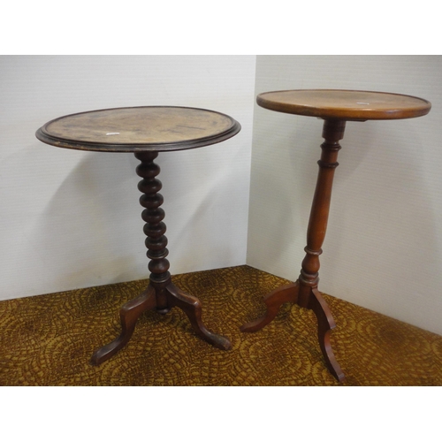 556 - Two antique mahogany occasional tables on tripod bases.