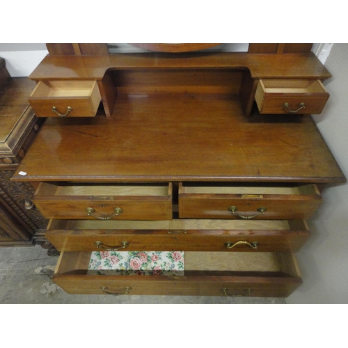 557 - Mahogany inlaid dressing chest.