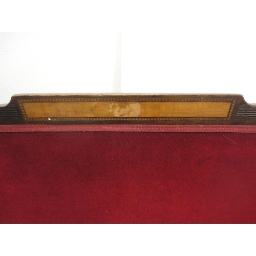 562 - Edwardian sofa upholstered in red velour, on square fluted supports.