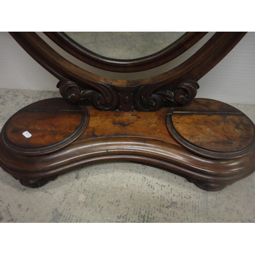 566 - 19th century mahogany dressing glass.