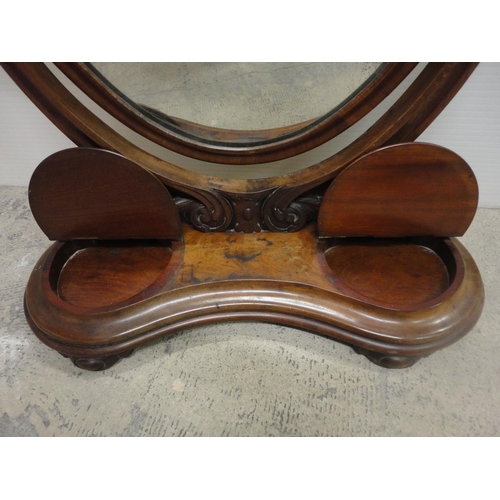 566 - 19th century mahogany dressing glass.