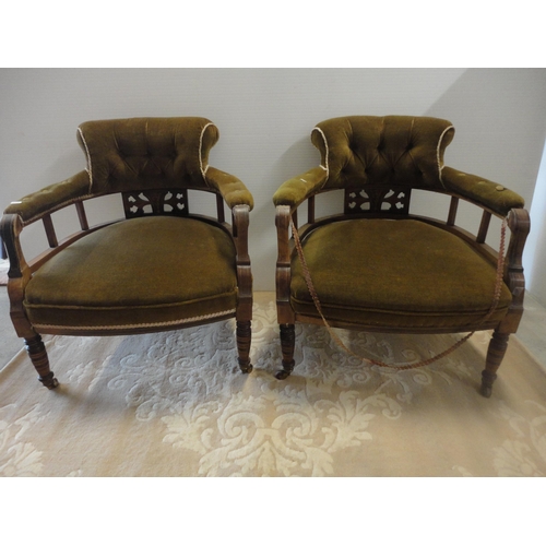 570 - Pair of Edwardian and later upholstered drawing room armchairs.