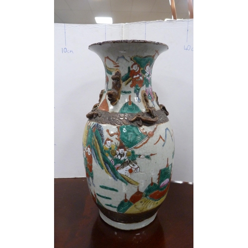 58 - Chinese crackle glazed vase with oxidised decoration.