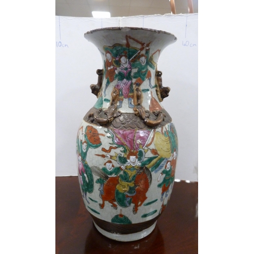 58 - Chinese crackle glazed vase with oxidised decoration.