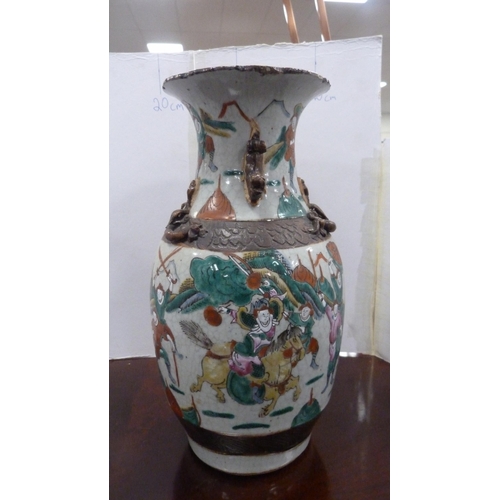 58 - Chinese crackle glazed vase with oxidised decoration.