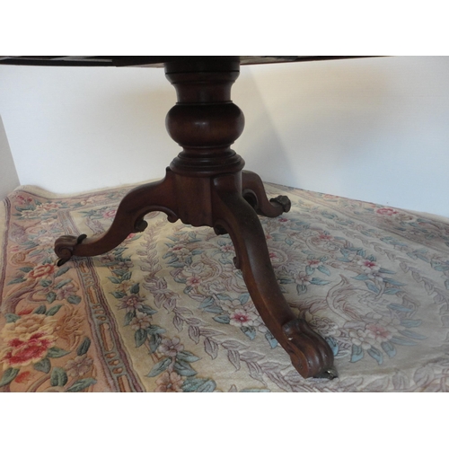 581 - 19th century mahogany breakfast table.