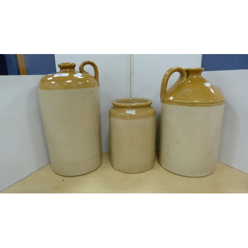 59 - Two stoneware flagons to include Grosvenor of Glasgow one gallon, Hunt's of Liverpool one gallon and... 