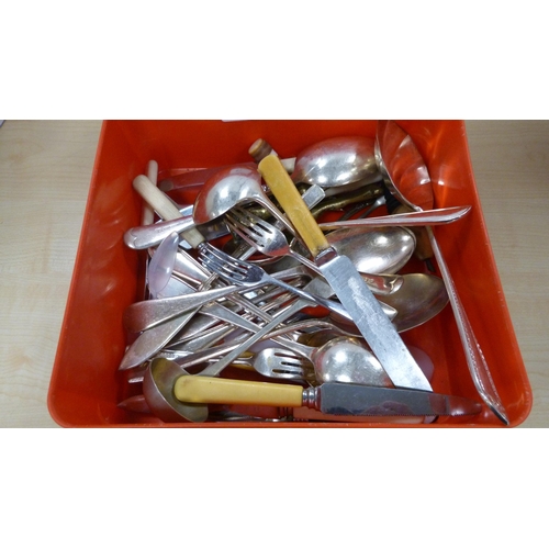 63 - Two silver napkin rings and assorted EP flatware to include ladles, spoons etc.