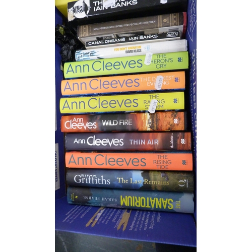 68 - Two cartons containing books to include novels, Penguin books, Ann Cleeves, Iain Banks and others.