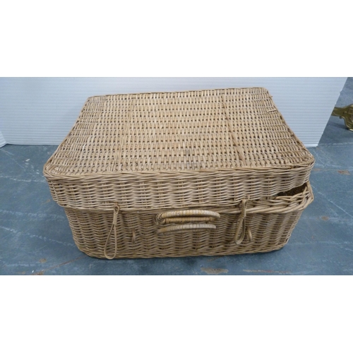 71 - Two wicker baskets containing a quantity of linen.