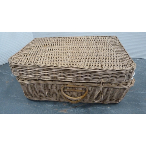 71 - Two wicker baskets containing a quantity of linen.