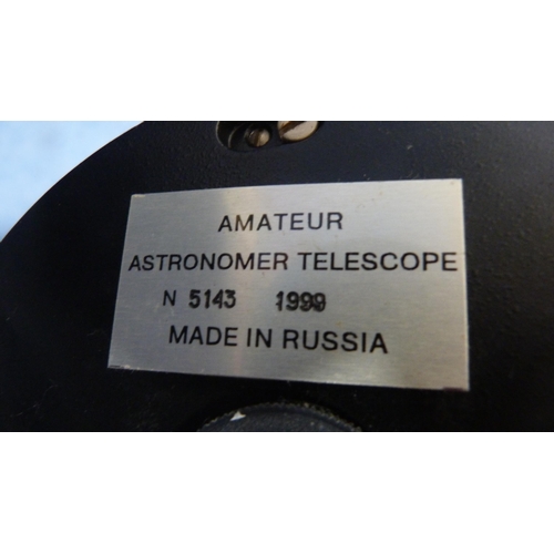 8 - Amateur astronomer's telescope, made in Russia, no. 5143 and dated 1999, on tripod stand, and a pair... 