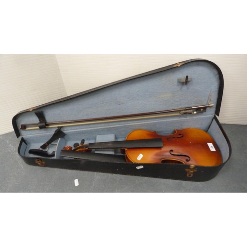 89 - Stradivarius copy violin with bow, in fitted case.