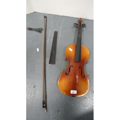 89 - Stradivarius copy violin with bow, in fitted case.