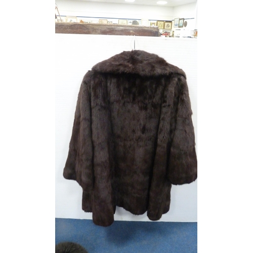 9 - Lady's simulated fur coat, similar hat, and a suede and simulated fur coat.  (3)