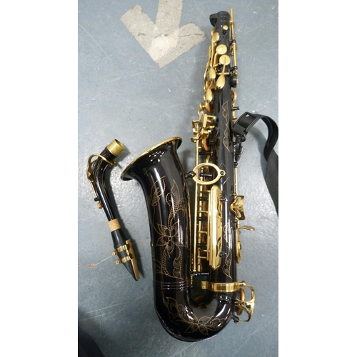 96 - Ammoon alto saxophone with accessories, book and fitted case.