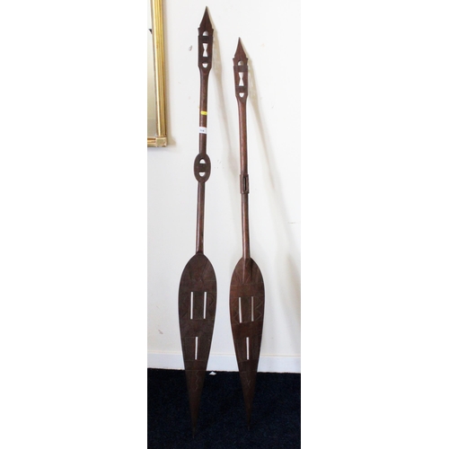 564 - Carved African paddles.