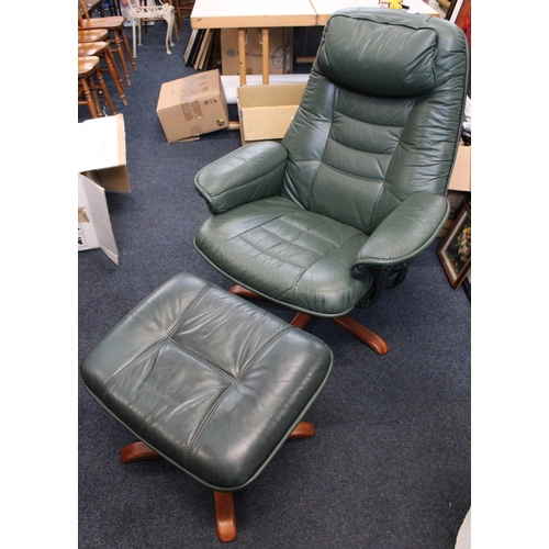 571 - Green leather Lazy Boy chair with matching footstool.